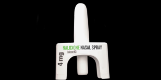 A single naloxone supply against black background. 