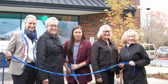 Senator Lieber, Governor Kotek, Mayor Beaty, President Peterson, and Commissioner Treece cut ribbon