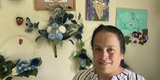 A portrait of Barbara in her home