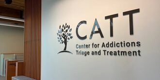 CATT Center for Addictions Triage and Treatment sign on wall