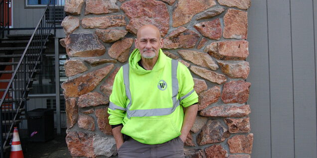 Picture of Russell standing in front of the Hillsboro Bridge Shelter