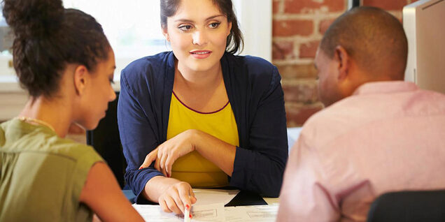 picture of a couple meeting with a third party