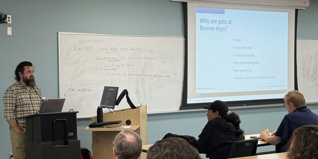 instructor presenting information about Animal Services to community members