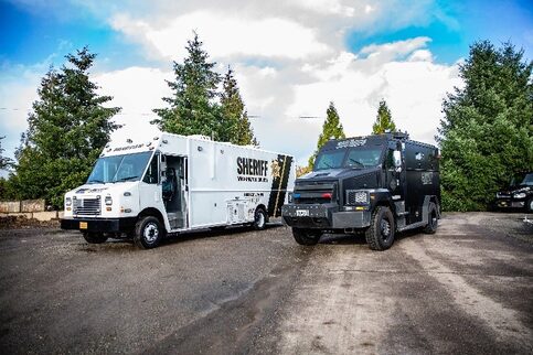 Sheriff's van and truck
