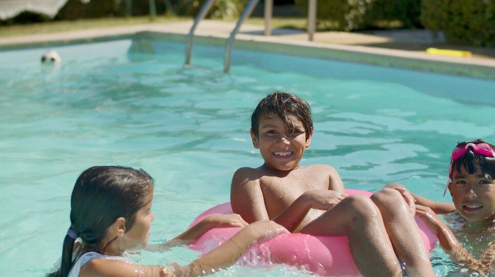 Kids swimming in pool